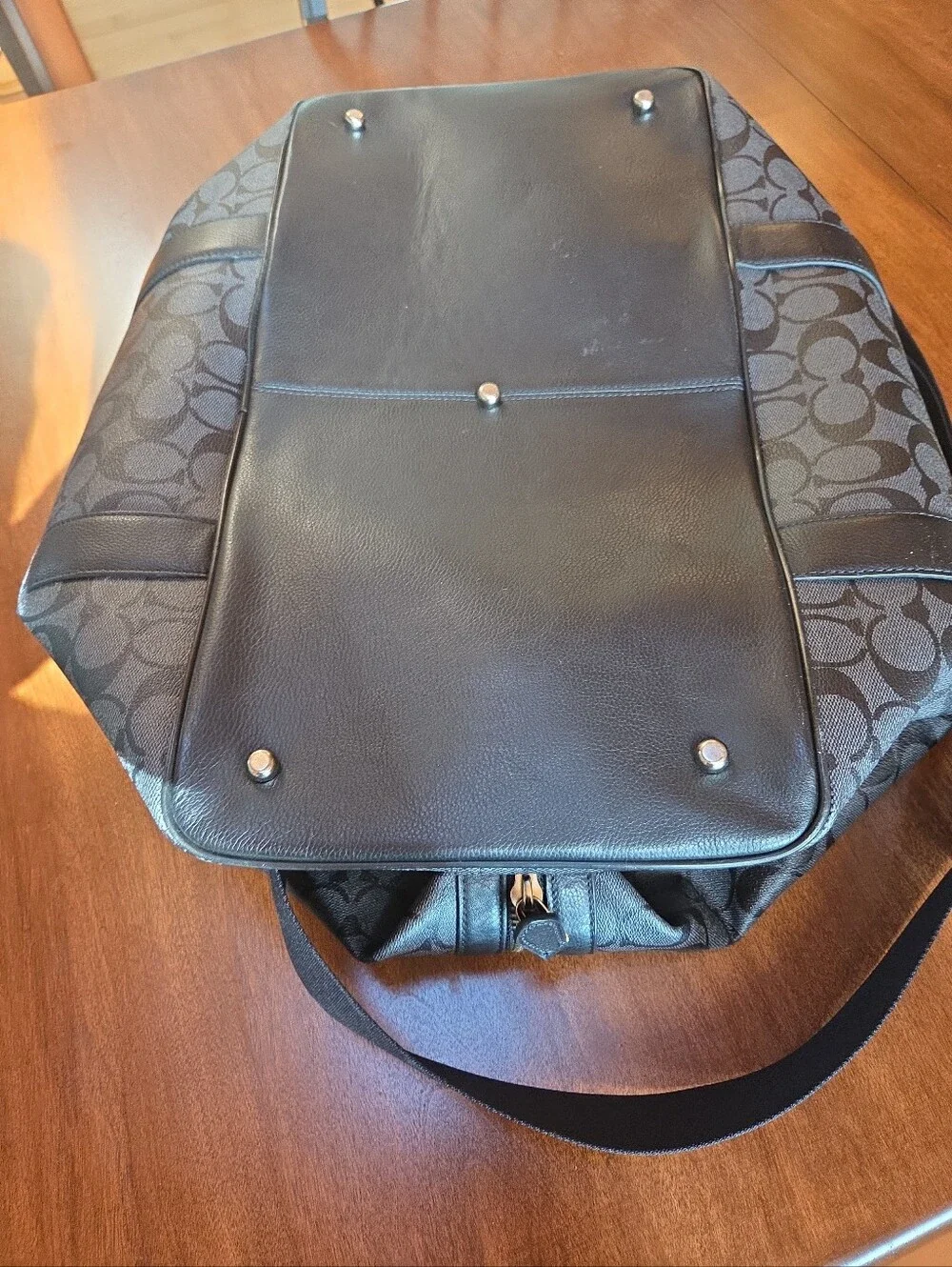 Coach Black Signature Leather Weekender tote bag dark gray and black.